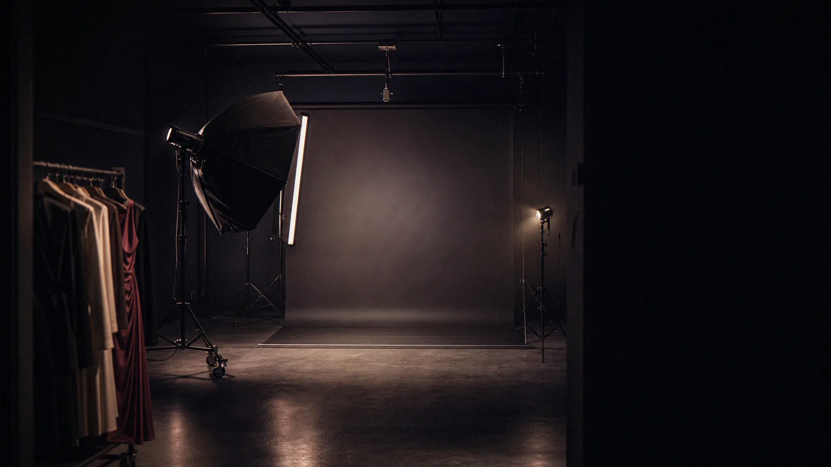 Empty product photography studio with lighting rig arranged for a catalog shoot